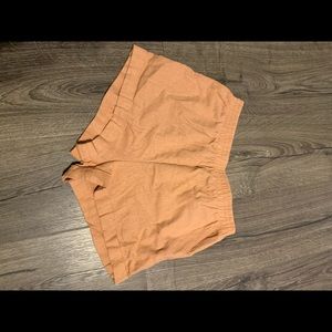 Very light orange cloth shorts